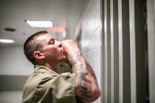 an_incarcerated_person_taking_medication
